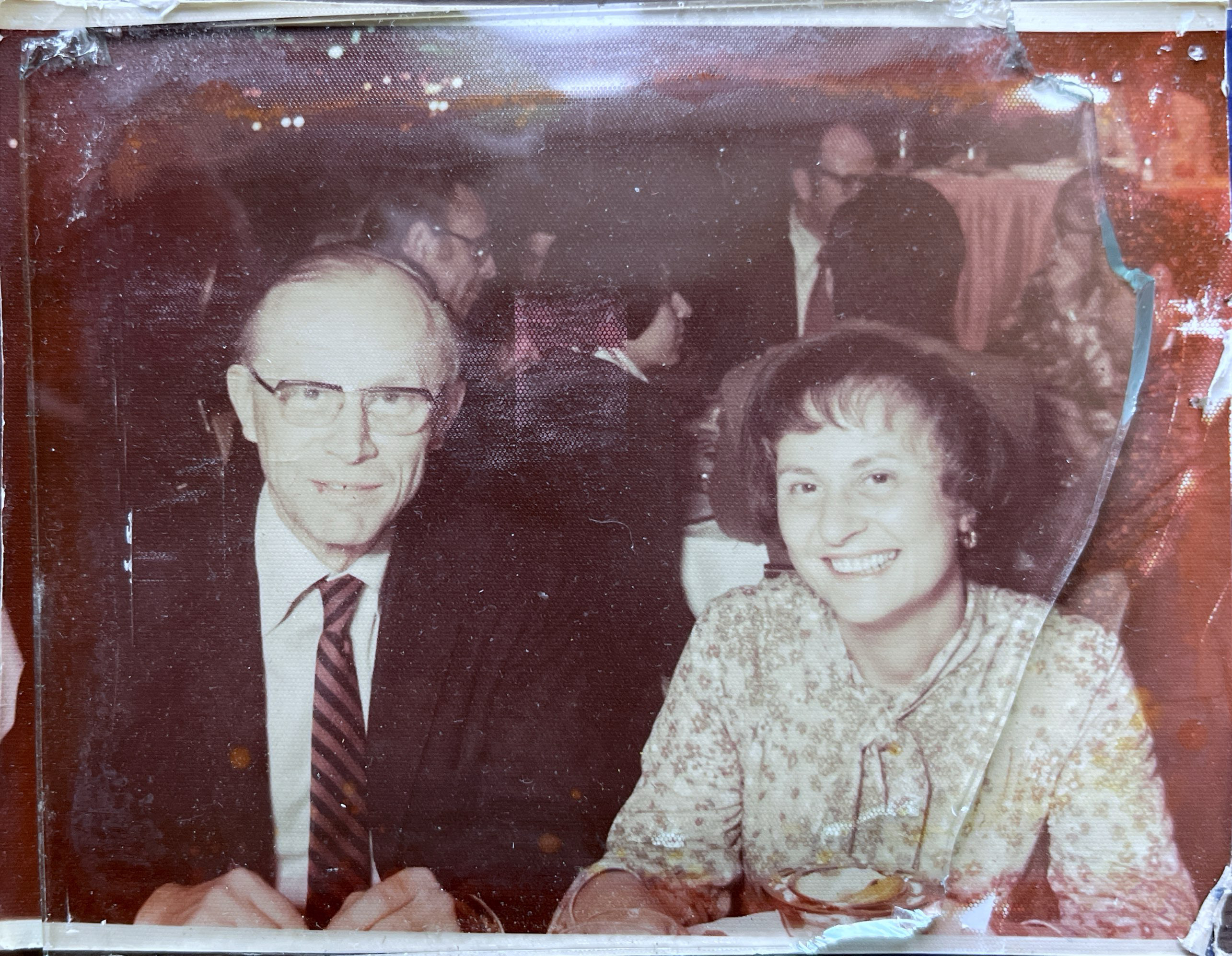 Vintage photo of a man and woman seated together smiling