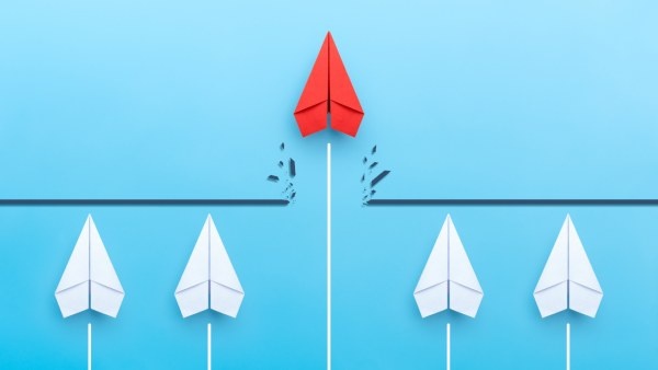 Illustration of a row of paper airplanes