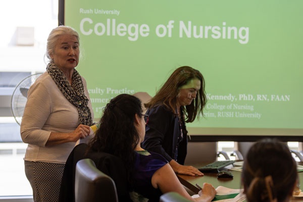 Woman giving a presentation at a conference