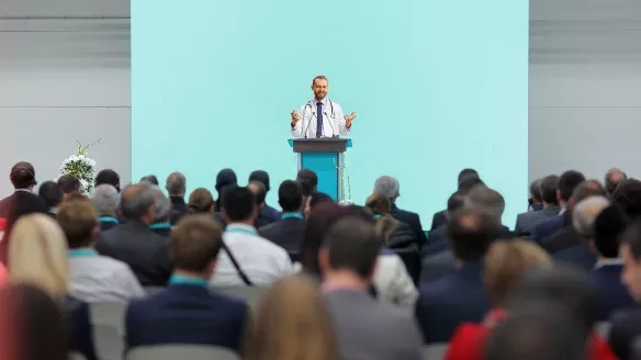 Presenter at podium