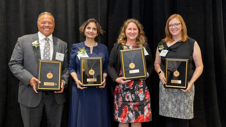 Pictured from left to right are Robert S.D. Higgins, MD, MSHA; Meenakshi Jolly, MD, MSCP; Mary J. Fidler, MD; and Hannah J. Lundberg, PhD.